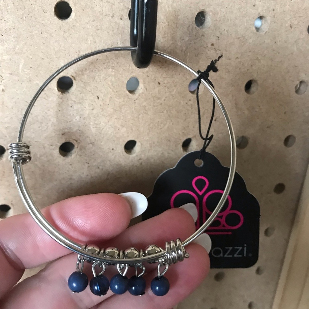 Silver wire bangle bracelet w/dk blue beads